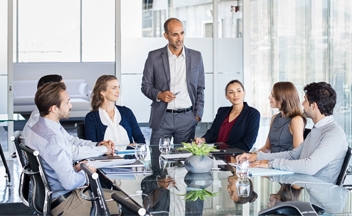 Business people at a conference table